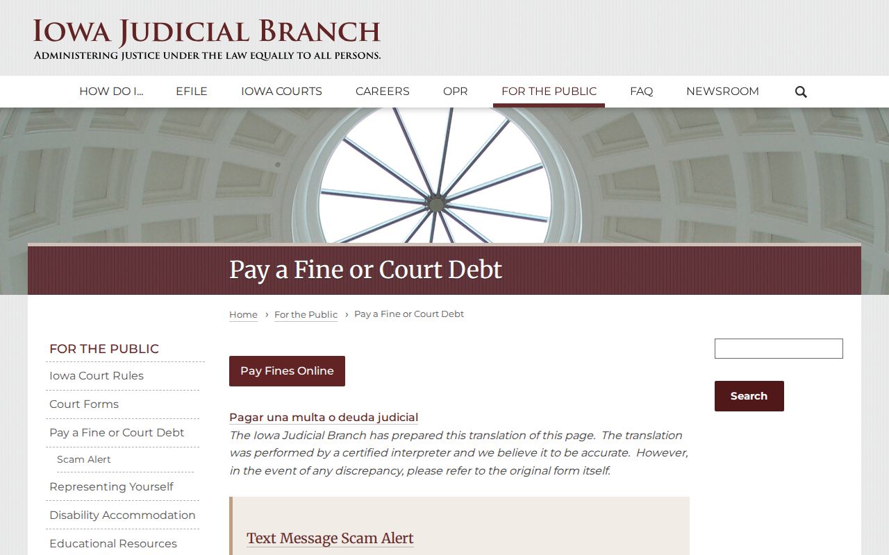 Official court debt payment guidance for a Mahaska County traffic warrant case